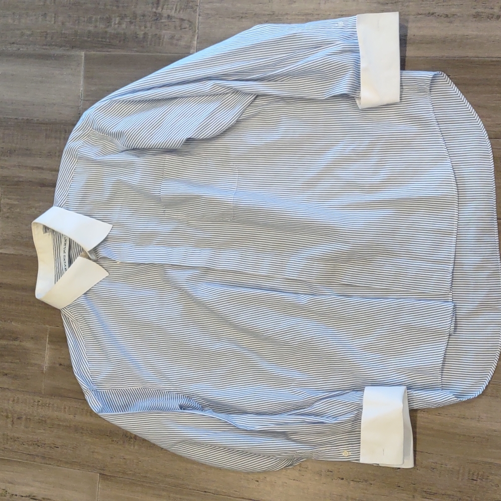 Striped dress shirt with fancy sleeves.